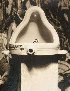 Marcel Duchamp's <i>Fountain</i> (1917), a urinal placed on its side, the quintessential work of avant-garde “anti-art.”